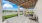 outdoor lounge area with covering
