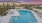 pool with lounge chairs