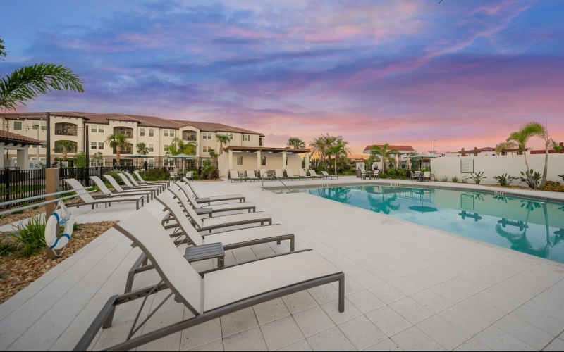 pool with lounge chairs